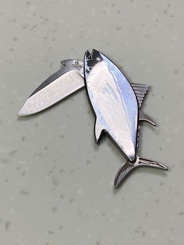 مطويه على شكل سمكه