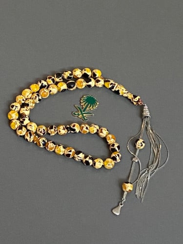 سبحه فاخره شبيه الكهرمان 33 خرزه