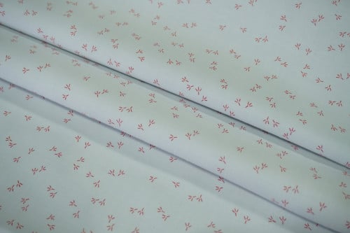 قماش قطن أبيض بنقوش حمراء