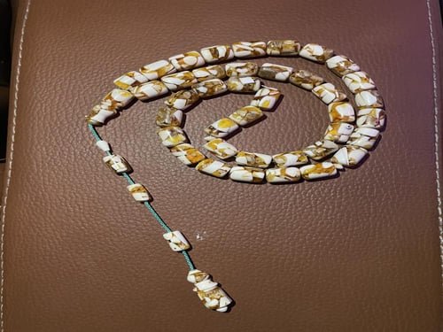 سبحة عاج و كهرمان