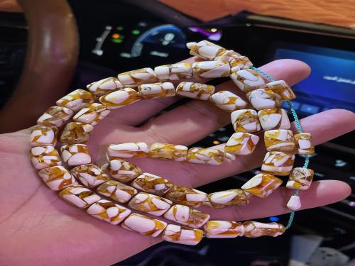 سبحة عاج و كهرمان