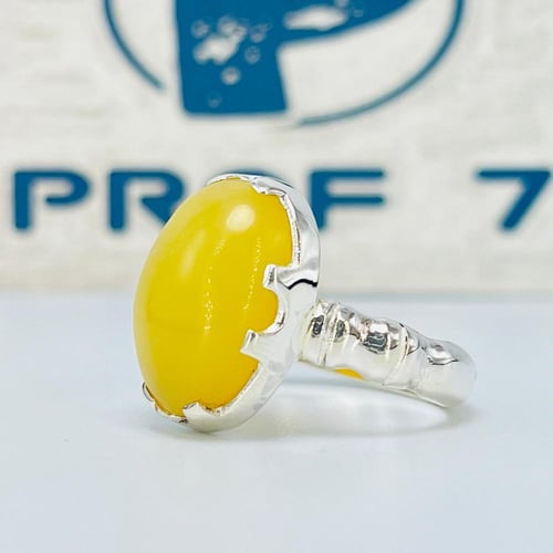 خاتم فضة ملكي بحجر كهرمان طبيعي بصياغة يدوية راقية