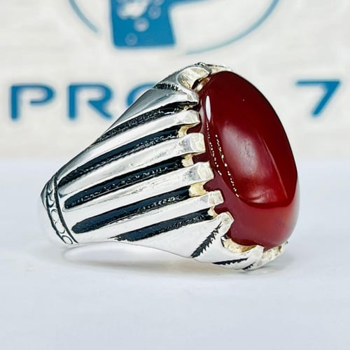 خاتم فضة مفصل عليه عقيق كبدي طبيعي صياغة يدوية اني...