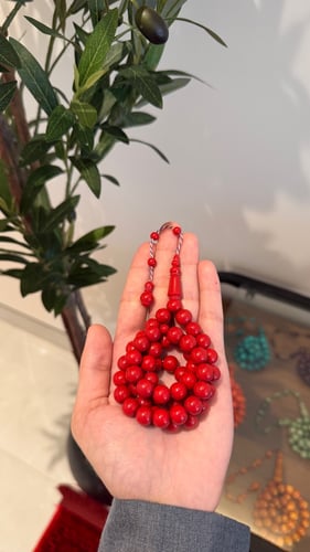 Polishing prayer beads