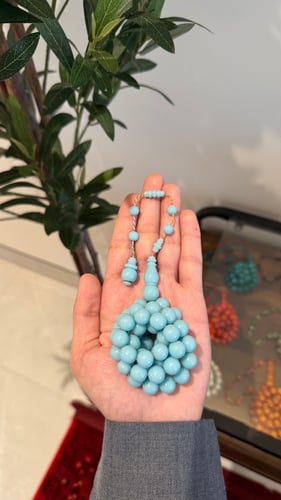 Polishing prayer beads
