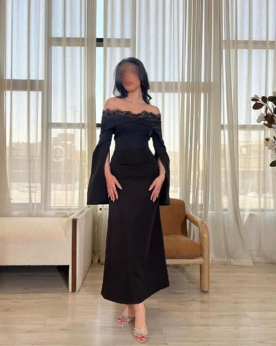 فستان ناعم اوف شولدر بأكمام طويلة لون أسود
