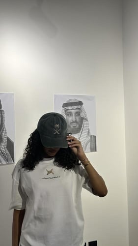 كاب اليوم الوطني أخضر