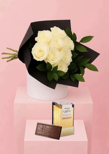 باقة ورد ابيض أناقة نقية مع 8 ورود بيضاء مع شوكلات...