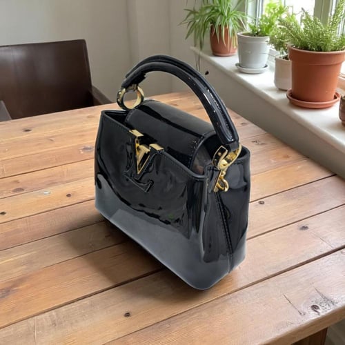 حقيبة يد كابسوين اسود لماع