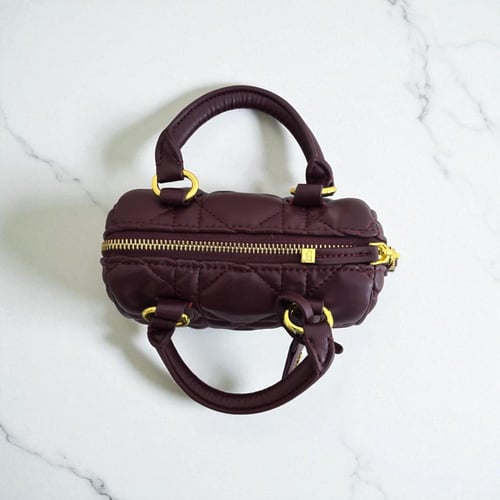 حقيبة ديور ميني عنابي