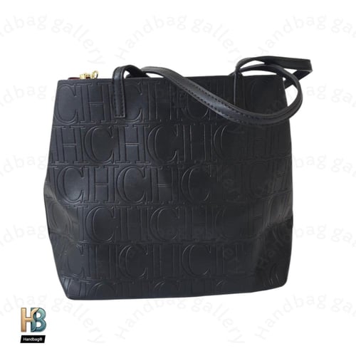 شنطة كارولينا هيريرا وسط اسود