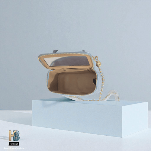 شنطة جلد شانيل ميكب سماوي لماع