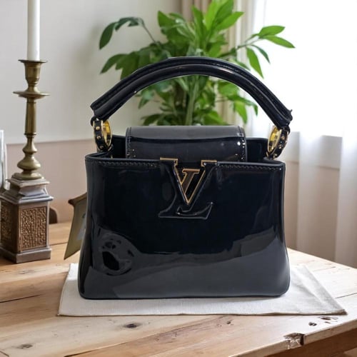 حقيبة يد كابسوين اسود لماع