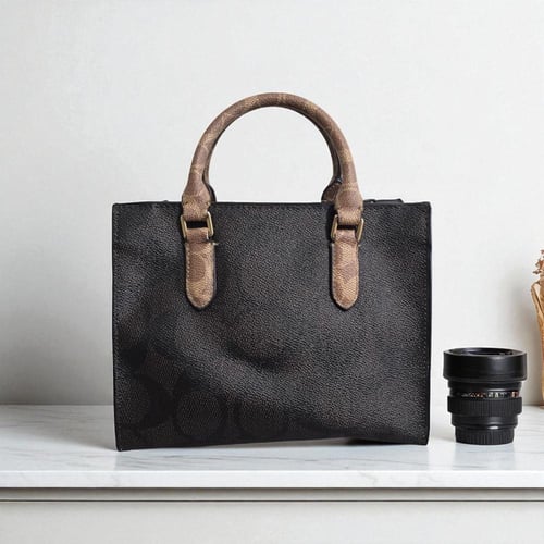 حقيبة كوتش وسط سقنتشر بني غامق