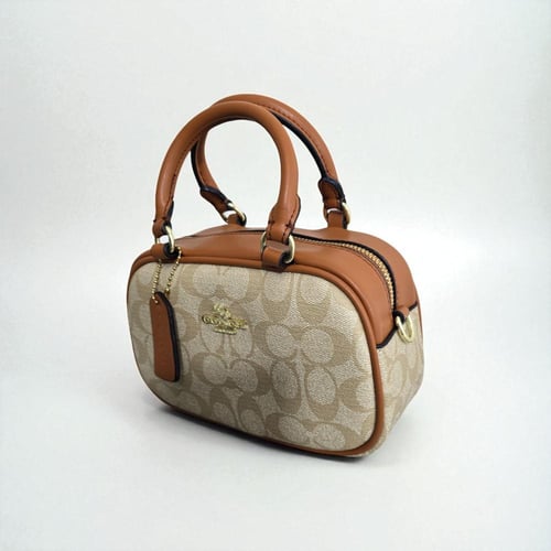 حقيبة كوتش سيكوير ميني بني فاتح