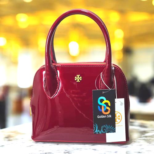 شنطة توري - بورش ميني أحمر لمــاع