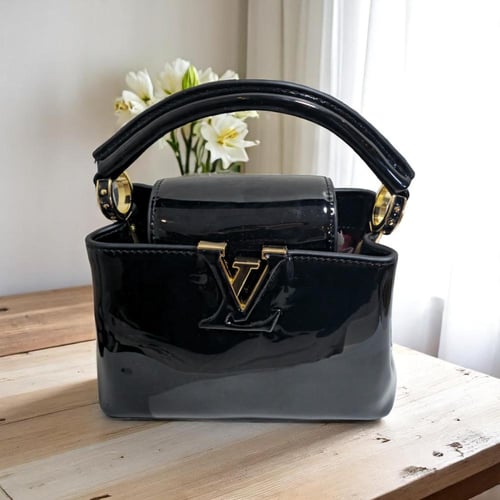 حقيبة يد كابسوين اسود لماع