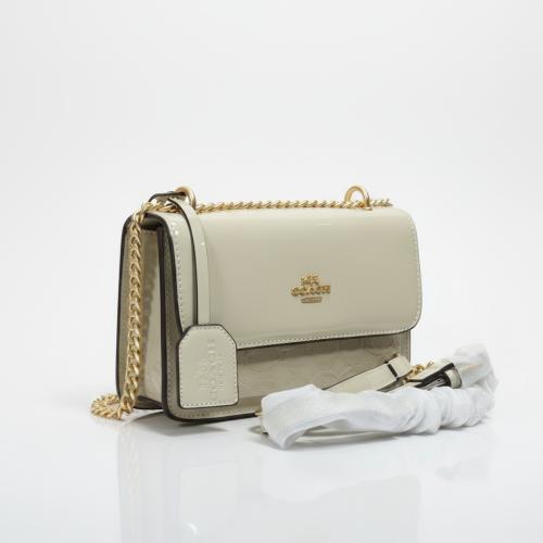 حقيبة كوتش لماع Gradient beige