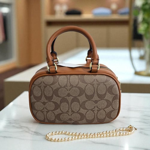 حقيبة كوتش سيكوير ميني بني مطفي