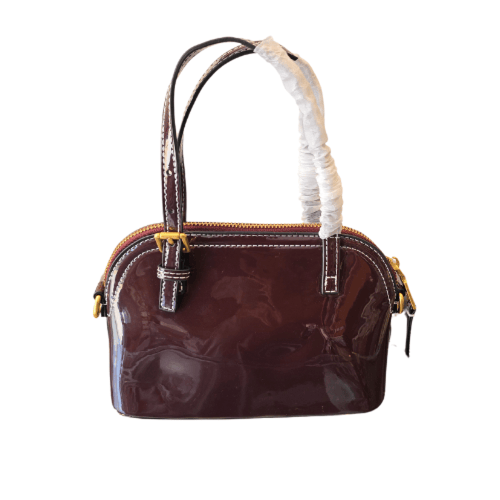 حقيبة توري بورش ميني عنابي غامق لماع