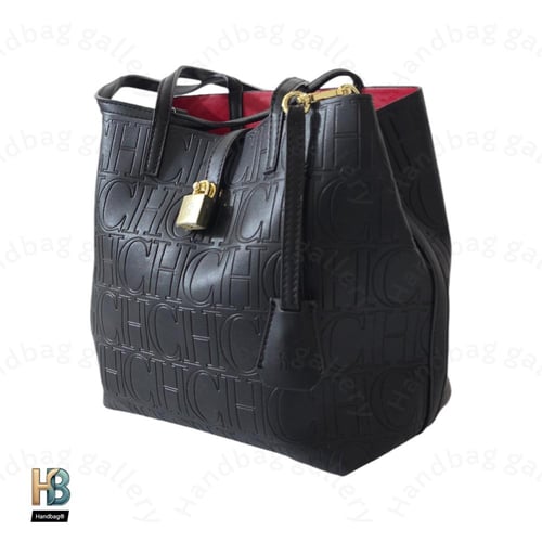 شنطة كارولينا هيريرا وسط اسود