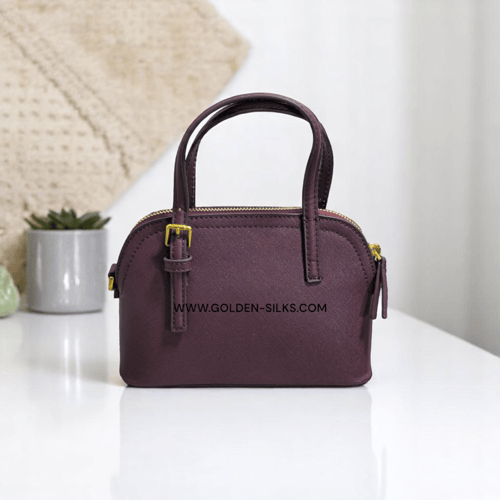 حقيبة توري بورش ميني برغندي مطفي