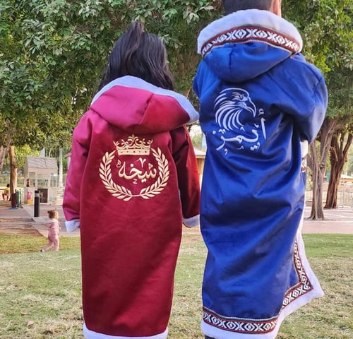 فروة شتوي بتطريز الاسم