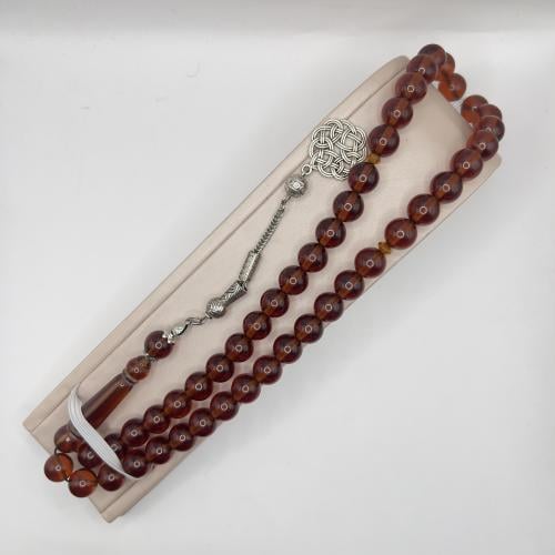 سبحة بكلايت شفاف بني