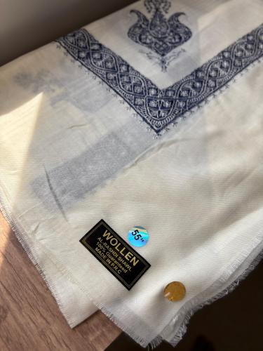 A navy Kashmir shawl