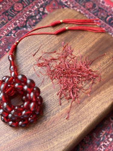 Red saffron prayer beads