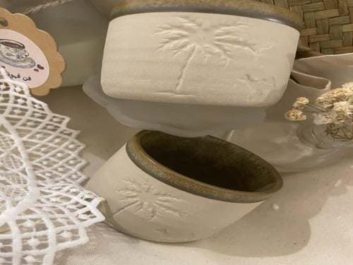 اكواب فخار بشعار نخله وجمل