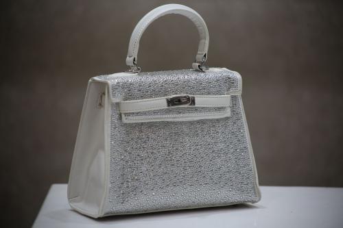 White handbag with beads