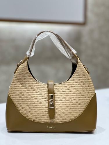 A beige JY bag with dark brown