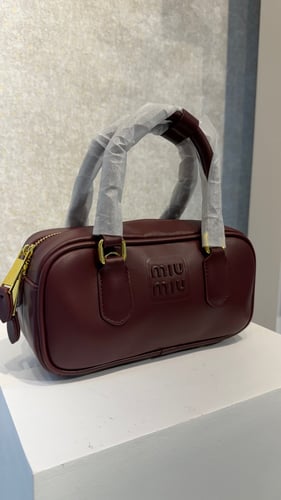 Mini Miu Miu bag in pomegranate