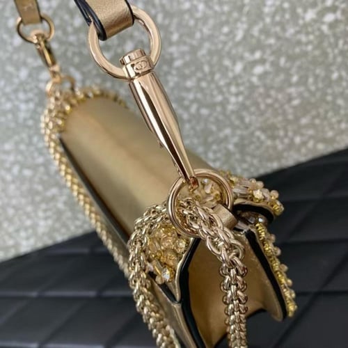 شنطة نسائية فالنتينو ميني - ذهبي