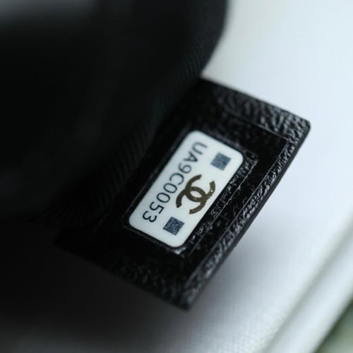 Chanel Black Quilted Lambskin Chain Around Mini Po...