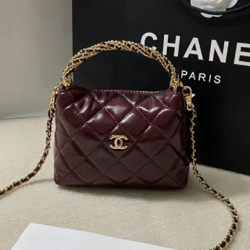 شنطة كوكو شانيل باللون العنّابي بتصميم هاندل جلد -...