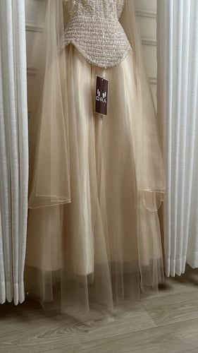 فستان بيج كلفه شك وتل تيواني لونين