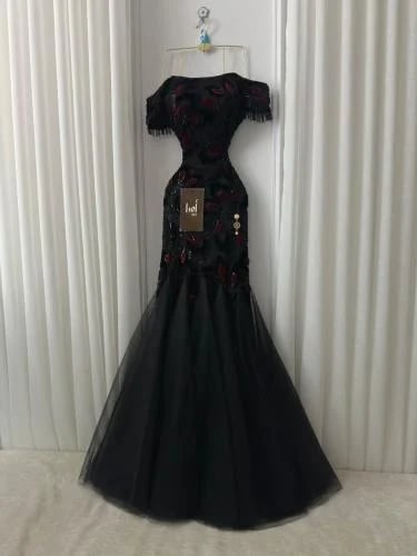 فستان اسود كلفه سهره راقي تدخيله تل تيواني