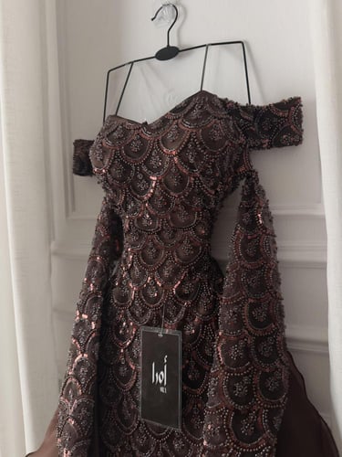 فستان اسود كلفه شك سهره ذيل جزار جنب