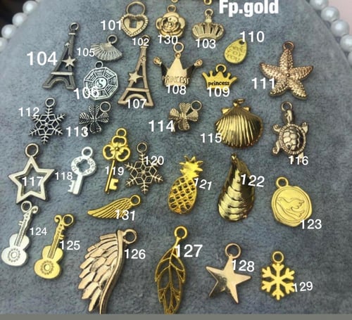 بروش مطلي ذهب مع تاج يمكن تغيير الفصوص مرفق صوره ل...