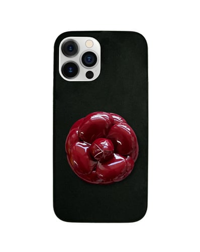 Red flower with black case