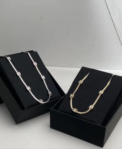 Silver chain necklace with multiple interlocking l...