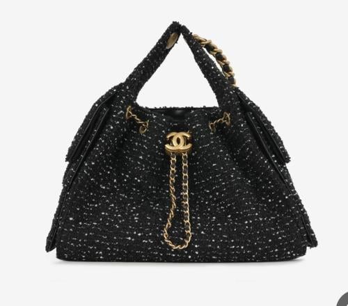 Chanel N25 Hobo bag crafted from black tweed with...