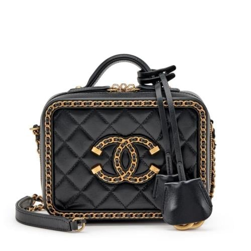 ChBa16 -he forever-trending Chanel CC Filigree Van...