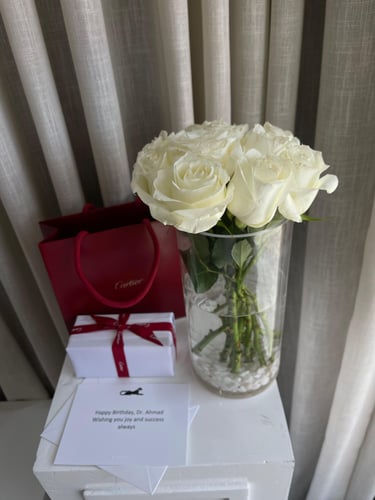 White rose vase with La Panthère Cartier perfume –...