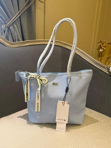 شنطة لاكوست سماوي