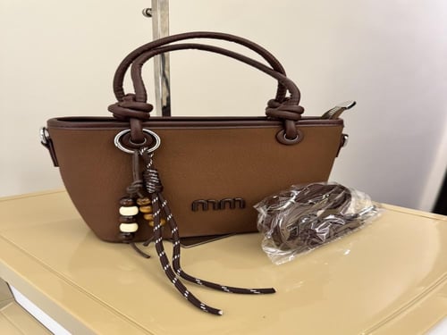 شنطة ميو درجات البني