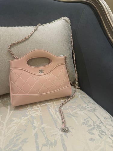 شنطة شانيل وردي