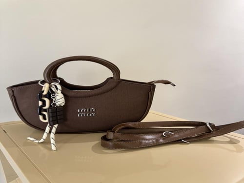 شنطة ميو قماس بني غامق